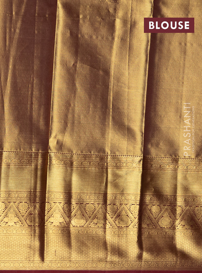 Pure silk tissue lehenga dhawani mustrad yellow and deep maroon with allover zari woven floral brocade weaves and long rich zari woven border