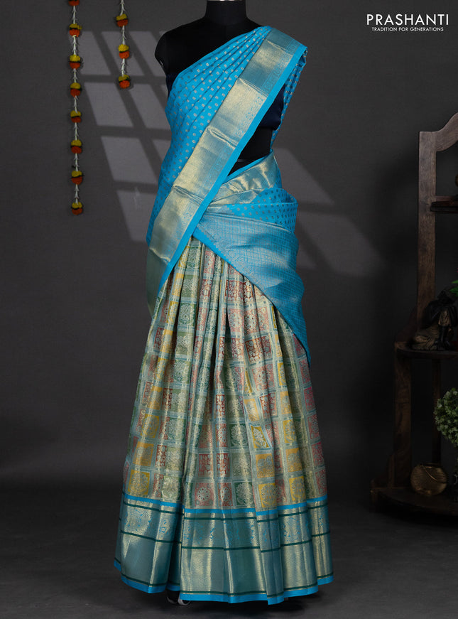 Pure silk tissue lehenga dhawani multi colour and light blue with allover zari woven brocade weaves and long rich zari woven border