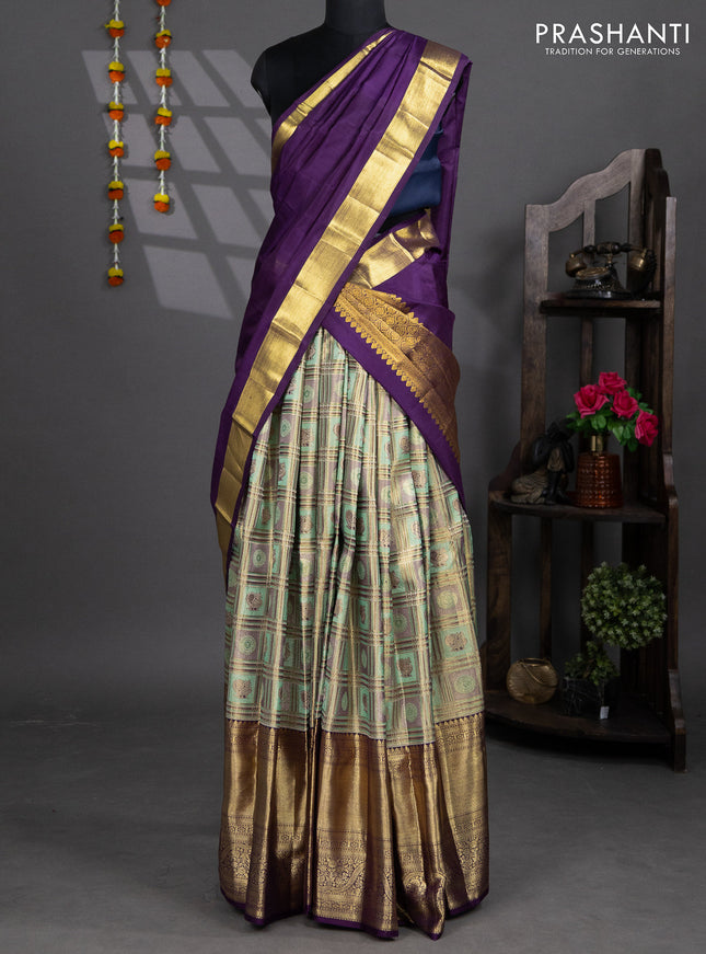 Pure silk tissue lehenga dhawani teal shade and purple with allover zari woven brocade weaves and long rich zari woven border