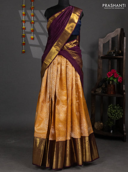 Pure silk lehenga dhawani mustard yellow and wine shade with allover zari woven elephant brocade weaves and long rich zari woven border