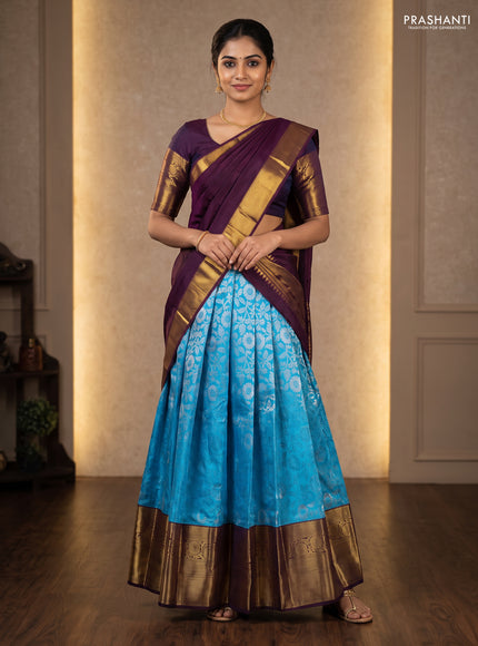 Pure silk lehenga dhawani light blue and jamun shade with allover silver zari woven floral brocade weaves and long rich zari woven border