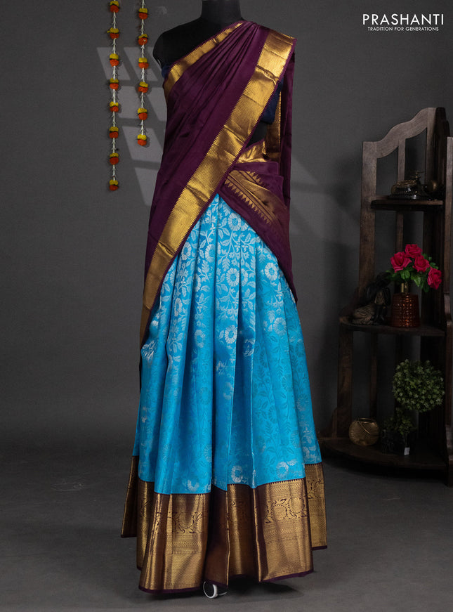 Pure silk lehenga dhawani light blue and jamun shade with allover silver zari woven floral brocade weaves and long rich zari woven border