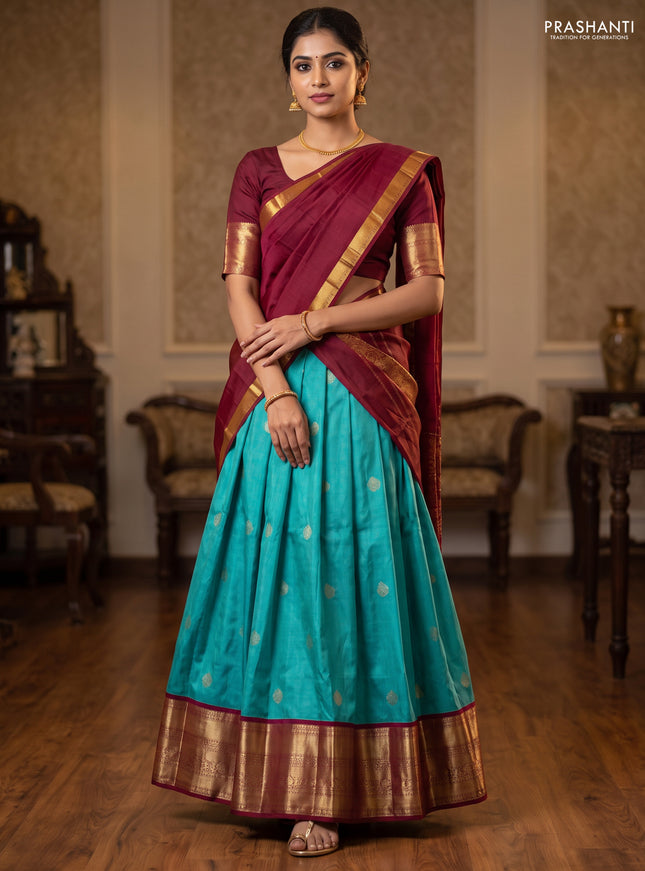 Pure silk lehenga dhawani teal blue and maroon with zari woven buttas and long rich zari woven korvai border