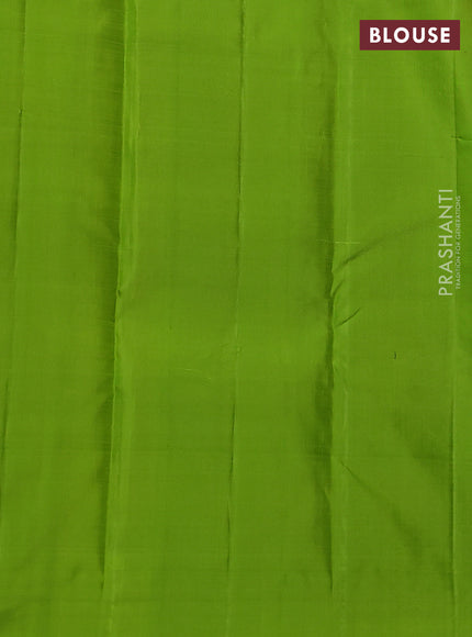 Pure kanchipuram silk saree dual shade of pinkish orange and light green with paisley zari woven buttas in borderless style