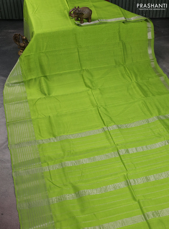 Mangalgiri silk cotton saree light green and dark grey with palin body and long silver zari woven border