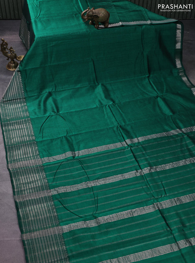 Mangalgiri silk cotton saree green and rust shade with palin body and silver zari woven border