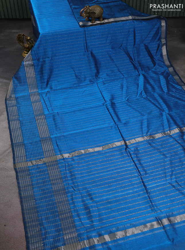 Mangalgiri silk cotton saree cs blue and rust shade with allover silver zari checked pattern and long silver zari woven border