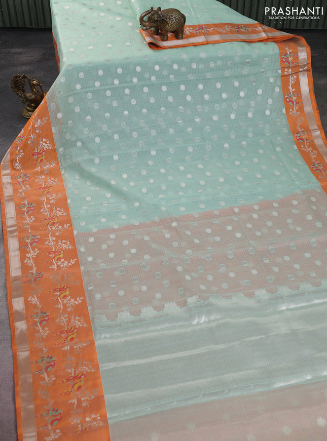 Cotton zari kota saree teal green and orange with silver zari woven coin buttas and zari woven parrot design border