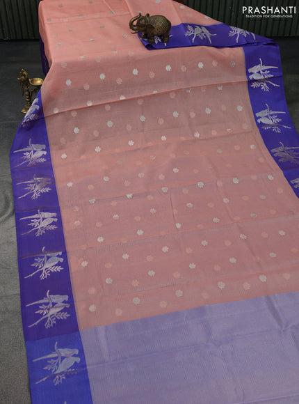Cotton zari kota saree peach shade and blue with zari woven floral buttas and zari woven butta border