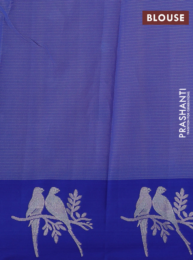 Cotton zari kota saree peach shade and blue with zari woven floral buttas and zari woven butta border