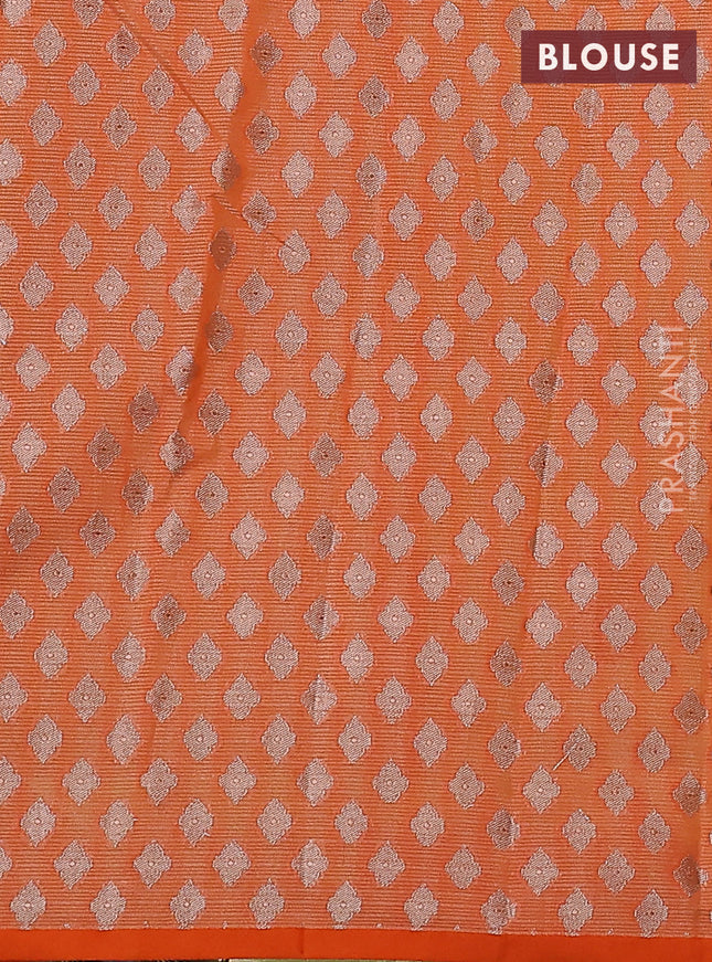 Cotton zari kota saree light green and orange with zari woven floral buttas and piping border