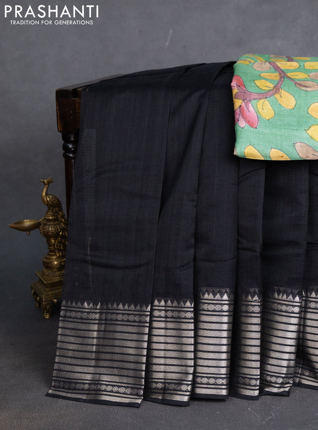 Mangalgiri silk cotton saree black and green shade with plain body and silver zari woven border