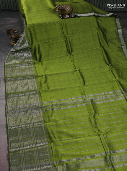 Mangalgiri silk cotton saree mehendi green and magenta pink with plain body and silver zari woven border