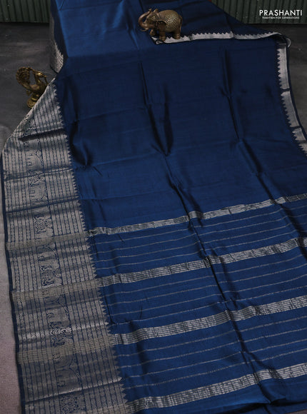 Mangalgiri silk cotton saree peacock blue and rust shade with plain body and long silver zari woven border