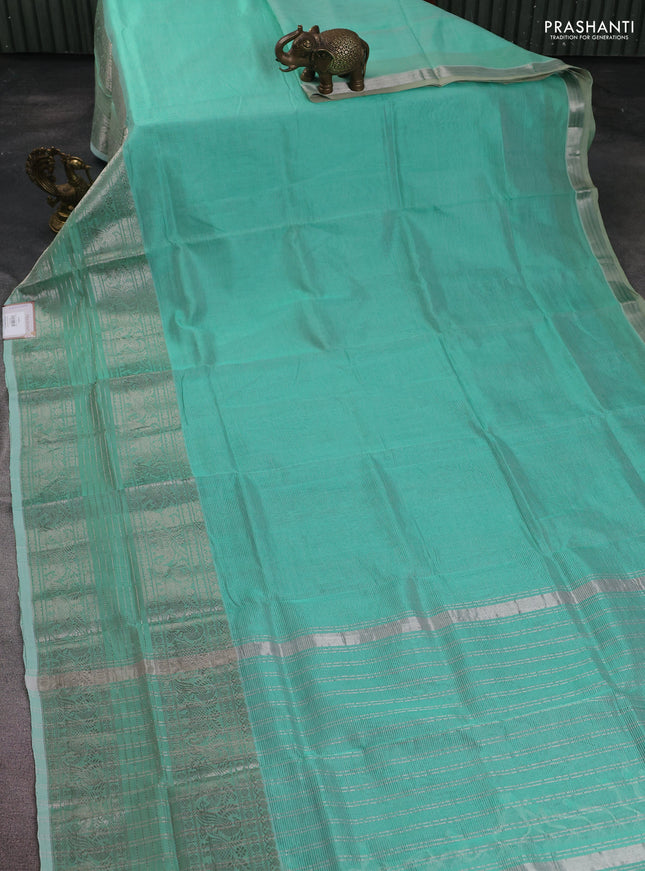 Mangalgiri silk cotton saree teal green and purple with plain body and long silver zari woven checked border