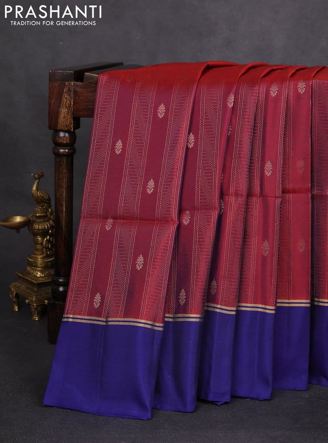 Kanchipuram silk saree dual shade of maroon and blue with allover zari weaves and zari woven simple border