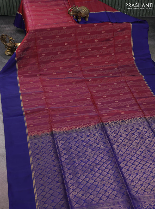 Kanchipuram silk saree dual shade of maroon and blue with allover zari weaves and zari woven simple border