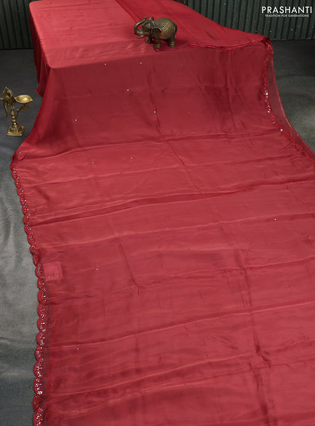 Satin crepe silk saree red shade and black with mirror work and ajrakh printed blouse