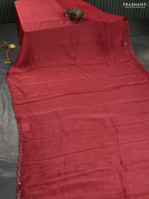 Satin crepe silk saree red shade and black with mirror work and ajrakh printed blouse