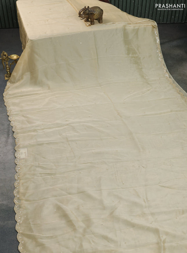 Satin crepe silk saree cream and black with mirror work and ajrakh printed blouse