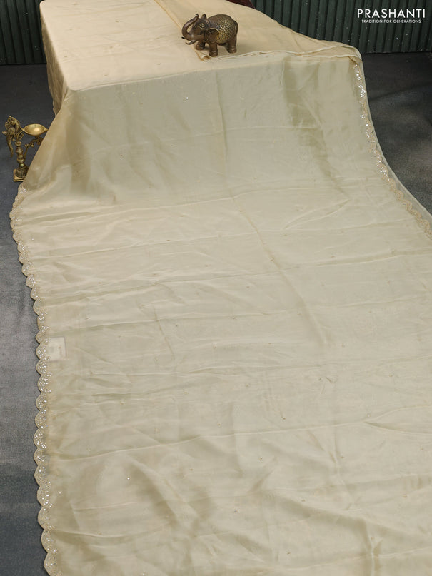 Satin crepe silk saree cream and black with mirror work and ajrakh printed blouse