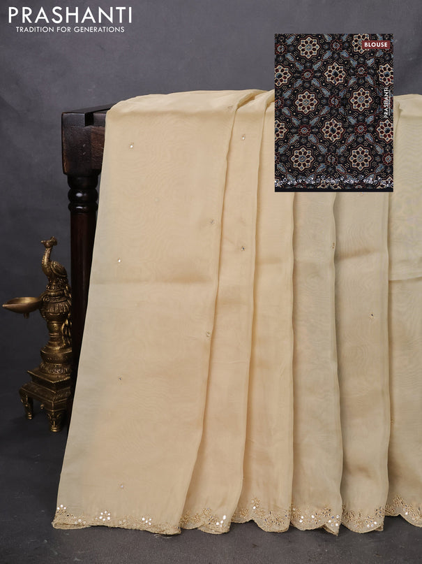 Satin crepe silk saree cream and black with mirror work and ajrakh printed blouse