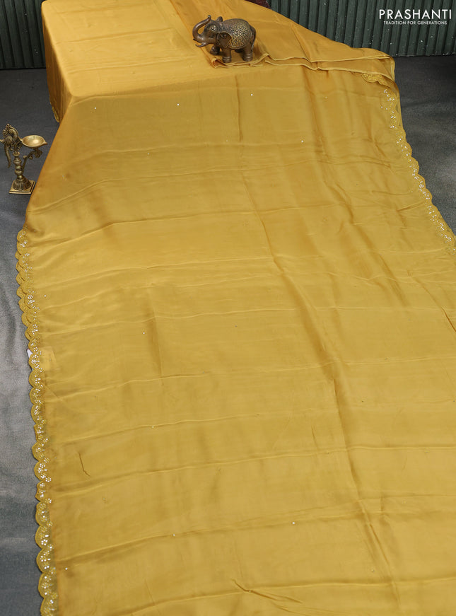 Satin crepe silk saree mustard yellow and green with mirror work and ajrakh printed blouse