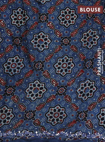 Satin crepe silk saree sandal and blue with mirror work and ajrakh printed blouse