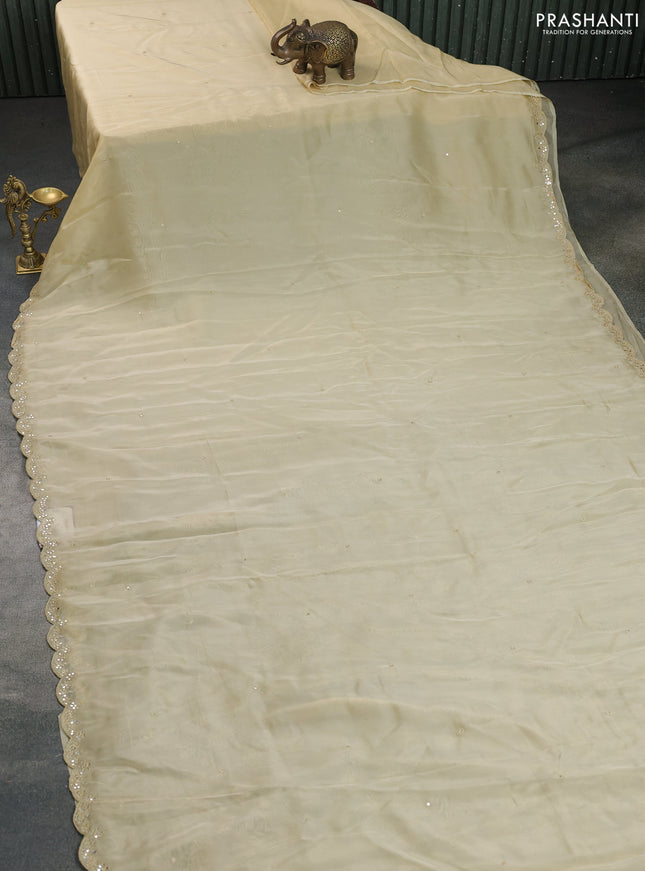 Satin crepe silk saree pale yellow and black with mirror work and ajrakh printed blouse