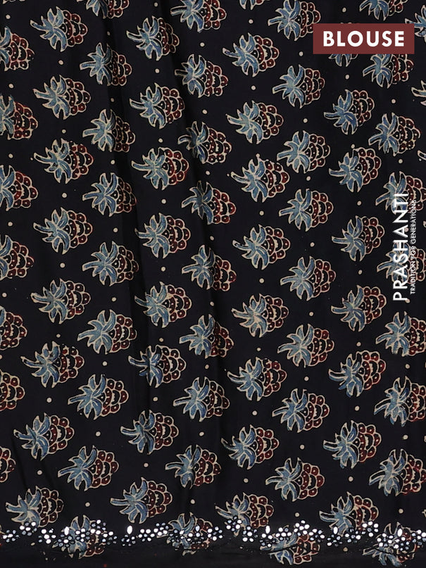 Satin crepe silk saree pale yellow and black with mirror work and ajrakh printed blouse