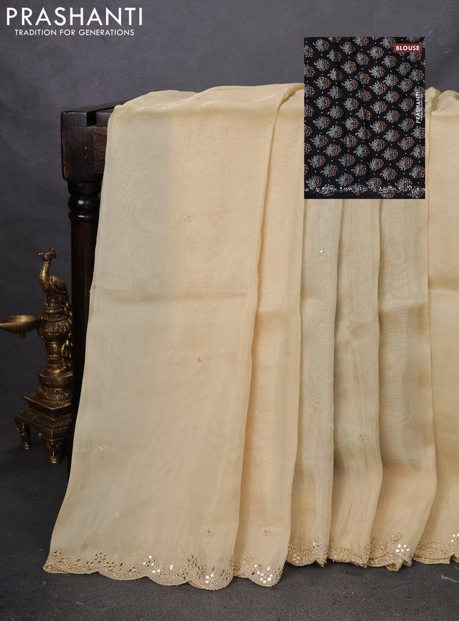 Satin crepe silk saree pale yellow and black with mirror work and ajrakh printed blouse