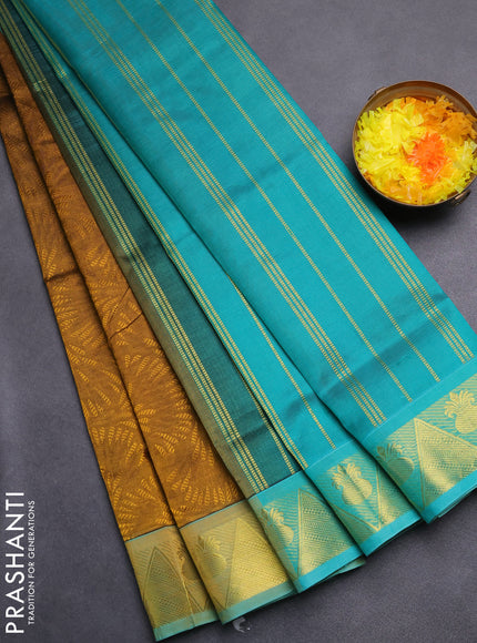 Silk cotton saree dark mustard and green with allover self emboss jacquard and zari woven border