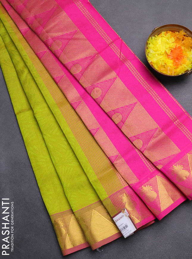 Silk cotton saree light green and pink with allover self emboss jacquard and zari woven border