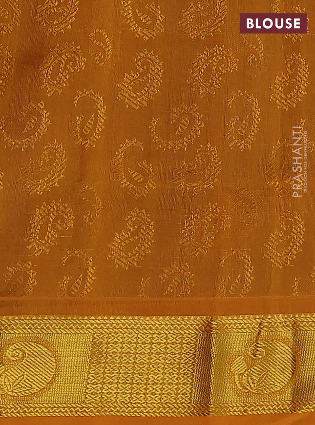 Silk cotton saree dual shade of maroon and mustard yellow with allover self emboss jacquard and zari woven border