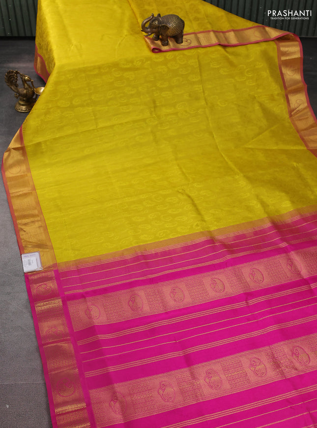 Silk cotton saree yellow and pink with allover self emboss jacquard and zari woven border