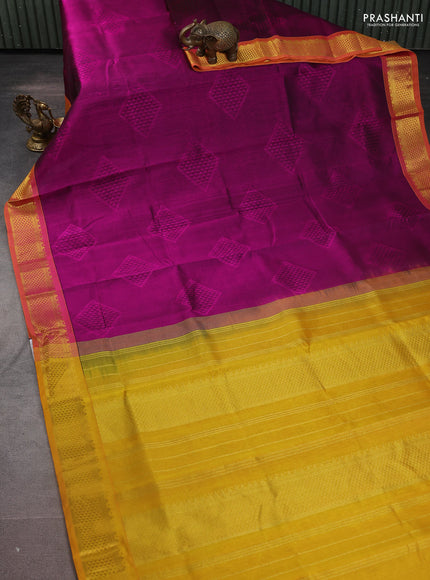 Silk cotton saree purple and mustard yellow with allover self emboss jacquard and zari woven border