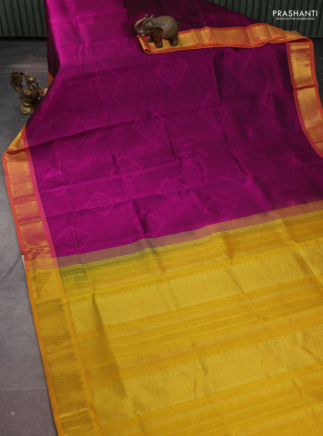 Silk cotton saree purple and mustard yellow with allover self emboss jacquard and zari woven border