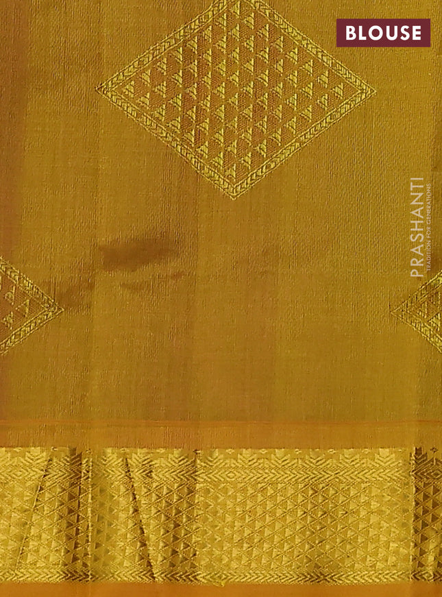 Silk cotton saree purple and mustard yellow with allover self emboss jacquard and zari woven border