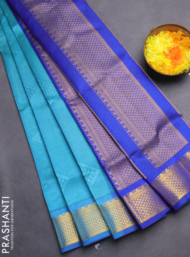 Silk cotton saree teal blue and blue with allover self emboss jacquard and zari woven border