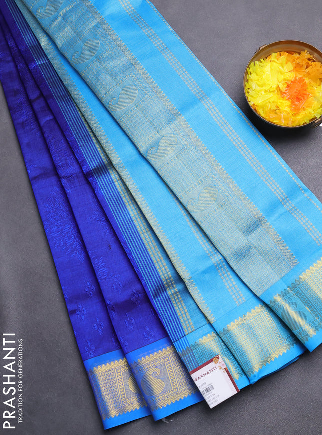 Silk cotton saree blue and cs blue with allover self emboss jacquard and zari woven border