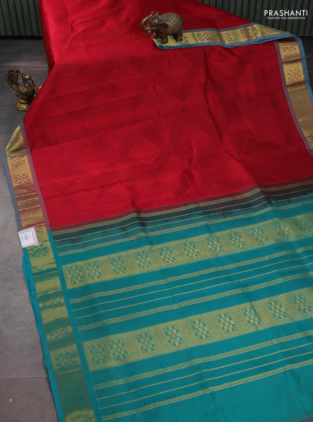 Silk cotton saree maroon and teal green with allover self emboss jacquard and zari woven border