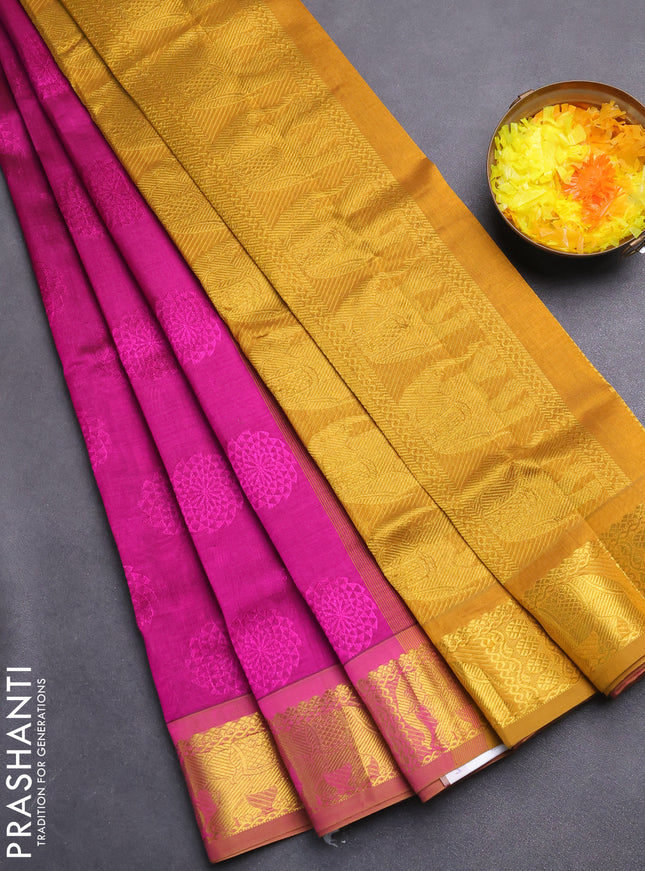 Silk cotton saree magenta pink and msutard yellow with allover self emboss jacquard and zari woven border