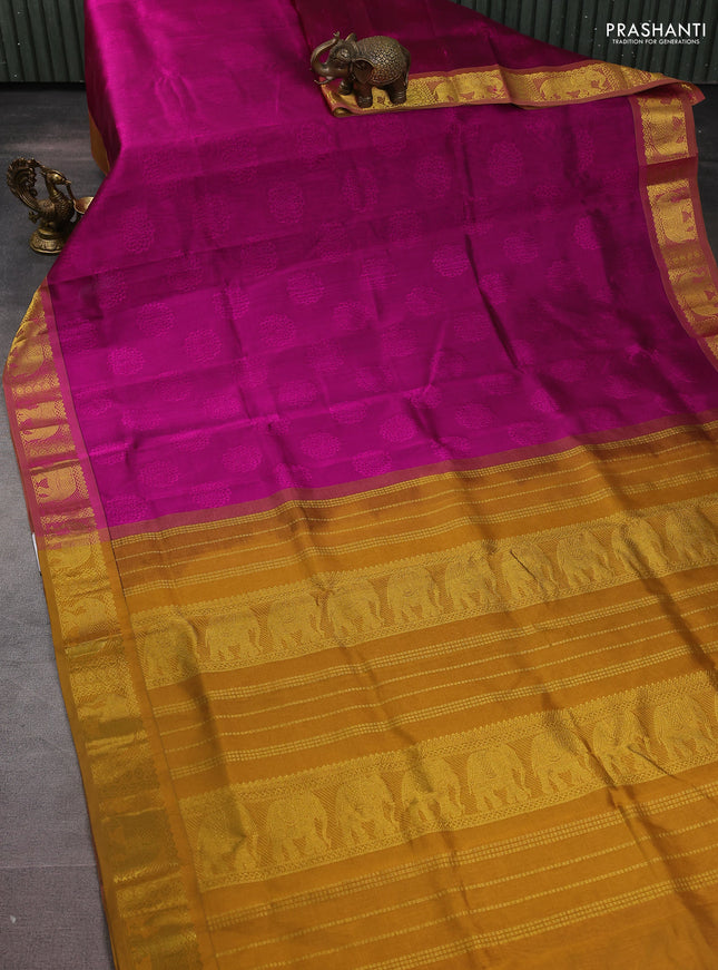 Silk cotton saree magenta pink and msutard yellow with allover self emboss jacquard and zari woven border