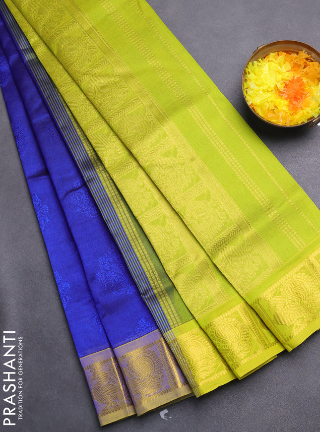 Silk cotton saree blue and fluorescent green with allover self emboss jacquard and zari woven border