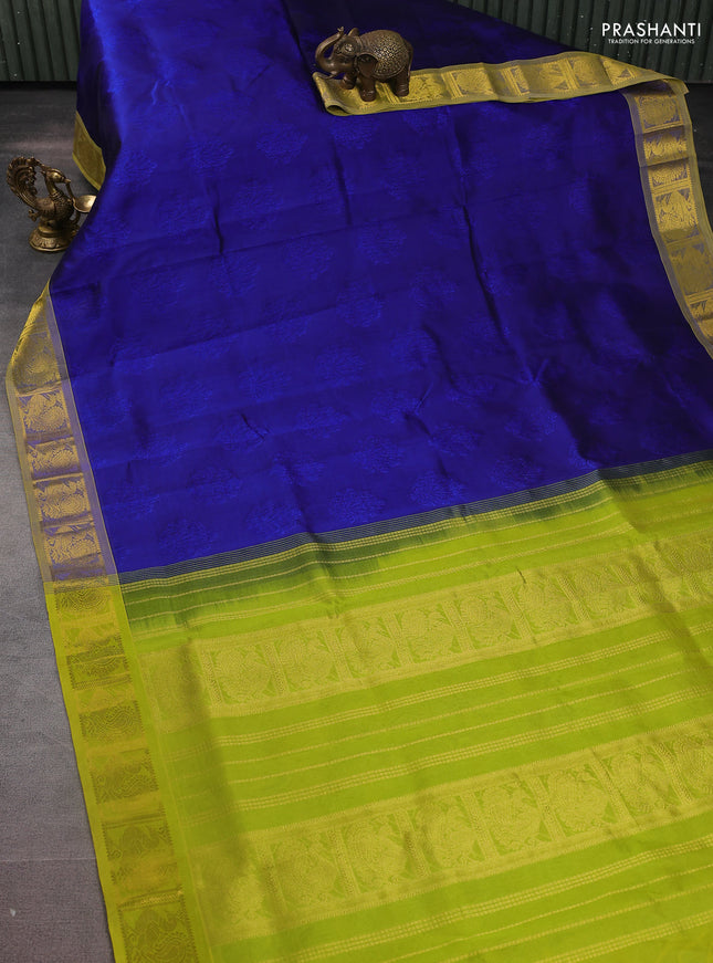Silk cotton saree blue and fluorescent green with allover self emboss jacquard and zari woven border