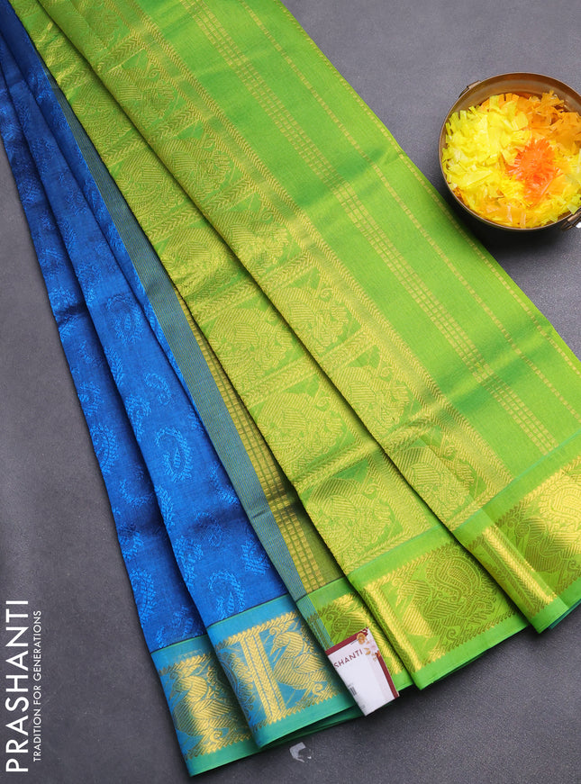 Silk cotton saree peacock blue and light green with allover self emboss jacquard and zari woven border