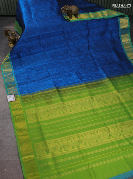 Silk cotton saree peacock blue and light green with allover self emboss jacquard and zari woven border