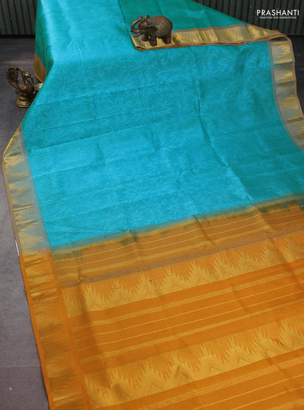Silk cotton saree teal blue and mustard yellow with allover self emboss jacquard and zari woven border