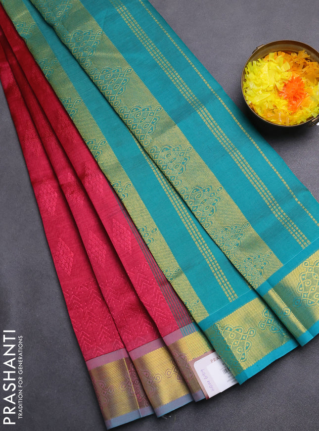 Silk cotton saree maroon and teal green with allover self emboss jacquard and zari woven border