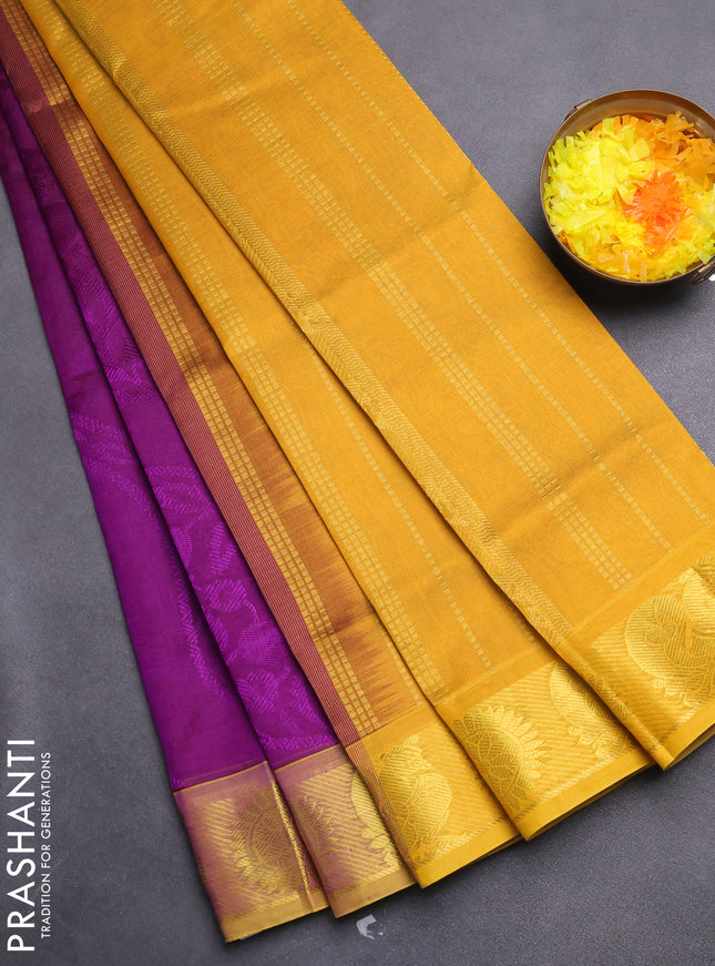 Silk cotton saree violet and mustard yellow with allover self emboss jacquard and zari woven border